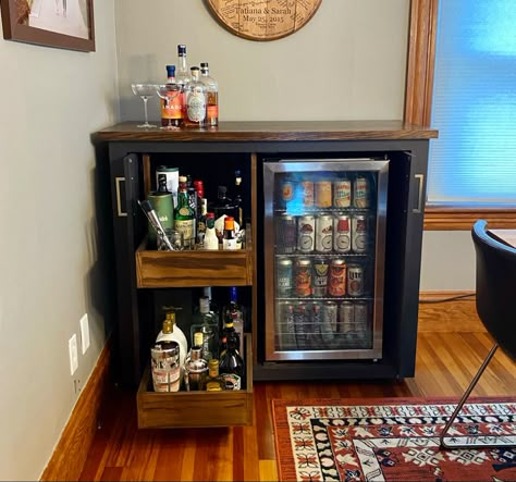 Small Drink Bar Ideas, Diy Bar Cart With Mini Fridge, Small Bars With Wine Fridge, Office Mini Bar Ideas, Very Small Bar Ideas, Drink Fridge In Living Room, Liquor Area Ideas, Tiny Basement Bar Ideas, Wine Fridge Bar Cart