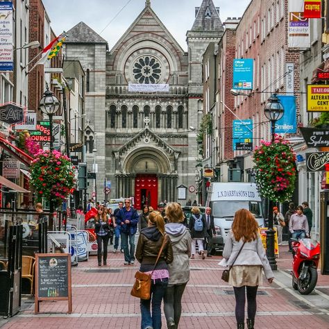 Tourists walking down Grafton Street in Dublin, Ireland Trinity Dublin College, On Dublin Street, Grafton Street Dublin, On Dublin Street Book, Howth Cliff Walk Dublin, Dublin Street, Walking City, Grafton Street, Cities To Visit