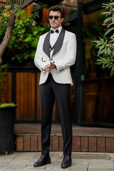 Crafted from the finest materials, our White Slim-Fit Tuxedo 3-Piece offers a luxurious experience like no other. The sumptuous fabric drapes elegantly over the body, enveloping the wearer in comfort and opulence from dusk till dawn.   #singlebreasted #suit #suits #slimfit #menstyle #menfashion #fashioninspo #formalwear #menclothing #formalattire #tuxedo #tuxedos #whitetuxedo Bow Tie Suit, Modern Fit Suit, Suit Styles, From Dusk Till Dawn, Suit Stores, Slim Fit Suit Men, Classy Suits, Slim Fit Tuxedo, White Tuxedo