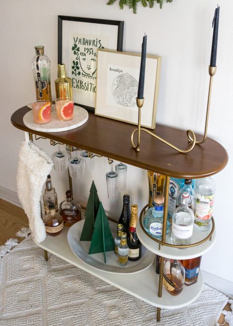 The holidays are nearly here! With holiday get togethers coming up I wanted to decorate my bar cart for the holiday season.... #homedecor #interiordecorating #barcartstyling #barcart #westelm #westelmbarcart #betterhomesandgardens #home #apartment #nycapartment #bloggerstyle #bloggerhomeinspo #interiordesign #interiorinspo #bloggerhome #apartmentstyle #smallspace #midcenturymodern #modernhome #baraccessories #barware #holidaydecor #holidaybarcart West Elm Bar Cart, Bar Cart Inspo, Holiday Bar Cart, Bar Corner, My Bar, Holiday Bar, Gold Bar Cart, Blogger Home, Bar Cart Styling