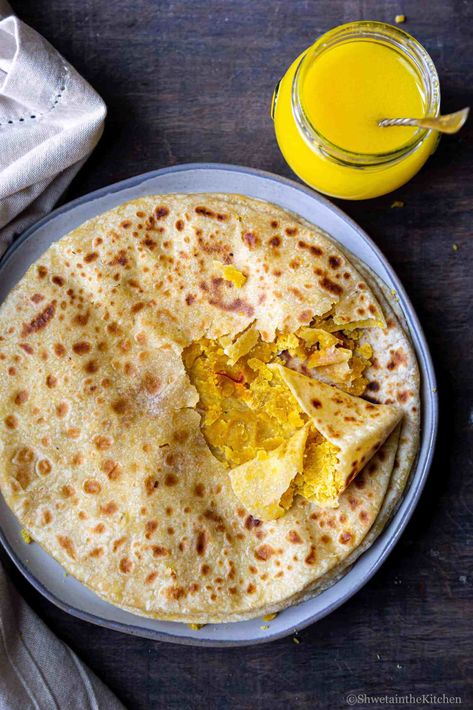 Puran Poli - Melt in mouth soft delicious marathi delicacy made with chana dal (yellow split bengal gram) and served with ghee.  #holi #ganeshchaturthi #indianfestival #puranpoli #healthy #instantpotrecipe Puran Poli Photography, Puranpoli Photography, Holi Props, Puran Poli Recipes, Poli Recipe, Puran Poli, Maharashtrian Recipes, Health Cooking, International Desserts