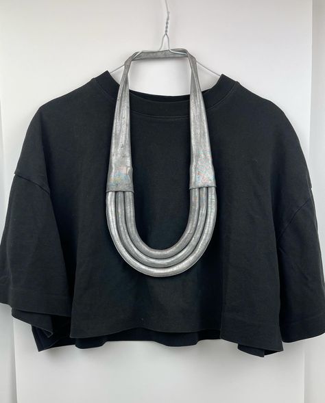 Hanging Metallic loop necklace// made of spandex stretch fabric ( and that’s it !! ) bold but super light 💡 Now available online 🩶🩶🩶 link in bio . . . #metalic #oversized #contemporaryartjewelry #wearableart #artjewlery#nycstyle #handmadeinbrooklyn Loop Necklace, Fiber Necklace, Art Jewelry Contemporary, Fabric Necklace, Artful Home, Chic Accessories, Accessories Necklace, Spandex Fabric, Wearable Art