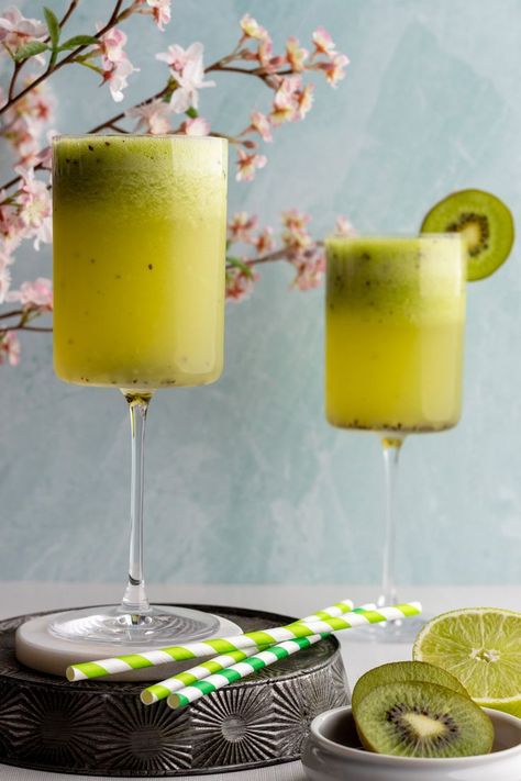 Kiwi Gin Cocktail in a tall glass head on shot Pear Cocktail, Yummy Summer Cocktails, Pear Cocktails, Homemade Syrup, Gin Cocktail, Fancy Cocktails, Summer Cocktail Recipes, Summer Cocktail, Kiwi Fruit