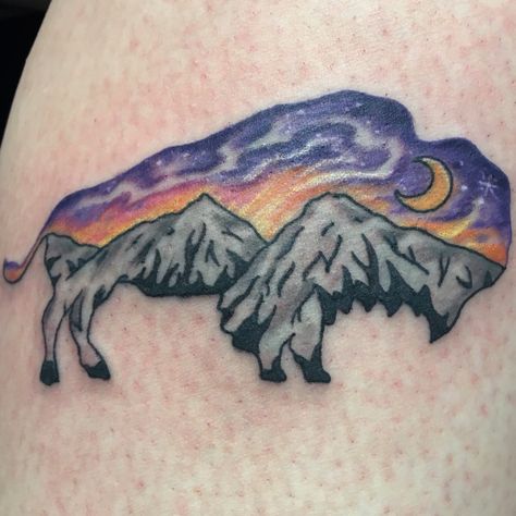 Bison tattoo with mountain scene Bison Tattoo Ideas, Buffalo Tattoo Ideas, Self Tattoo Ideas, Warrior Symbol Tattoo, Mountain Tattoo Ideas, Bear Tattoo Ideas, National Park Logo, Bison Tattoo, Buffalo Tattoo