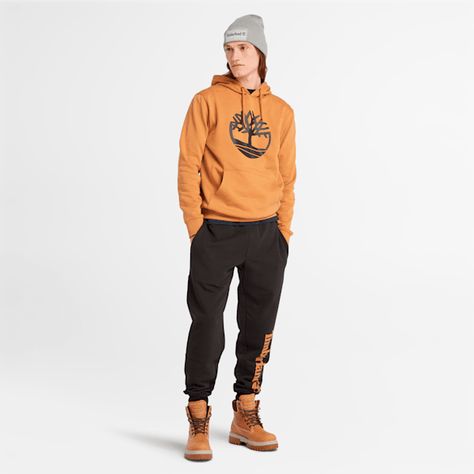 Stay warm and cozy this winter with our comfy, cotton-blend hoodie with a contrasting tree logo. It’s packed with features like an adjustable hood and a large front pocket to hold all your essentials. Timberland Hoodie, Neutral Tops, Tree Logo, Tree Logos, Basic Sweatshirt, Cardigan Shirt, Outdoor Men, Chino Trousers, Timberland Mens