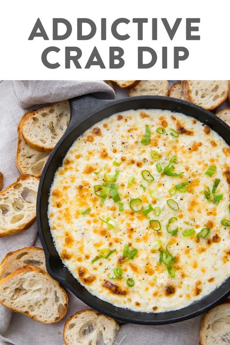 This crab dip is truly addictive! It's a super easy and ultra delicious, rich and creamy appetizer made with crab, green onions, cream cheese, mayo, and cheese. Served with crackers, chips, or bread for the best tailgating, holiday, or party dish. Low carb, keto, gluten free. #appetizer #dip #tailgating #entertaining #keto Warm Crab Dip, Baked Crab Dip, Creamy Crab Dip, Best Christmas Appetizers, 40 Aprons, Hot Crab Dip, Creamy Crab, Gluten Free Appetizers, Christmas Recipes Appetizers