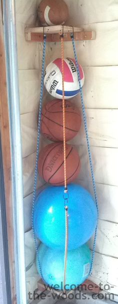 DIY Ball Corral - Welcome to the Woods. Store all those bouncy balls, basketballs, soccer balls, and volleyballs in an accessible and sensible way in your garage. Great tutorial on how to build it! Patio Organization, Garage Organize, Ball Storage, Bouncy Balls, Patio Storage, Space Ideas, Play Space, Kids Wood, Diy Garage