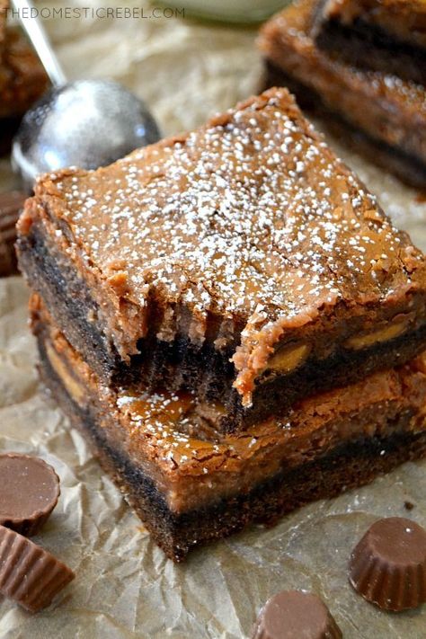 These Reese's Chocolate Peanut Butter Gooey Bars are outrageous! A chocolate brownie bottom topped with Reese's peanut butter cups and a glorious chocolate peanut butter gooey layer! An EASY recipe that's sure to impress! Chocolate Gooey Bars, Reese's Chocolate, Gooey Bars, Reese's Peanut Butter Cups, Peanut Butter Desserts, Peanut Butter Lovers, Reeses Peanut Butter, Peanut Butter Chocolate, Peanut Butter Recipes