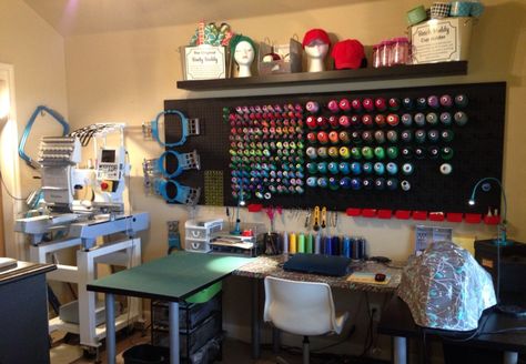 This is my embroidery business workroom. The pegboard wall is a wonderful way to organize thread spools, yet keep them out where you can see them. Hoops hang on robe hooks. The desks and shelf above the thread wall are IKEA. Embroidery Storage Ideas, Embroidery Hoop Storage, Crate Storage Bench, Small Kitchen Cabinet Storage, Embroidery Room, Boy Toy Storage, Craft Storage Ideas, Shed With Loft, Ideas For Embroidery