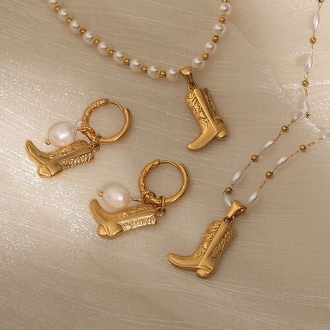 Popular 18k Gold Plated Stainless Steel Anti Tarnish Jewelry Sets Western Cowboy Boot Pearl Necklace #jewelry#jewellry#jewelry_image#jewelry_photo_editing#jewelry_image_retouch#photo_editing #jewellery#jewellerydesign#jewellerylover#jewelleryaddict#fashionjewellery#jewellerylovers #jewellerygoals#jewelleryforeveryone#jewelleryaddicted#jewelleryinspo#jewellerybusiness #affordablejewellery#jewellerytrends#minimaljewellery#jewellerydesigns#minimalistjewellery #elegantjewellery#necklaces Cowboy Boot Necklace, Cowboy Jewelry, Urban Cowboy, Tarnished Jewelry, Pearl Necklaces, Earrings Pearl, Jewelry Images, Western Jewelry, Cowboy Boot