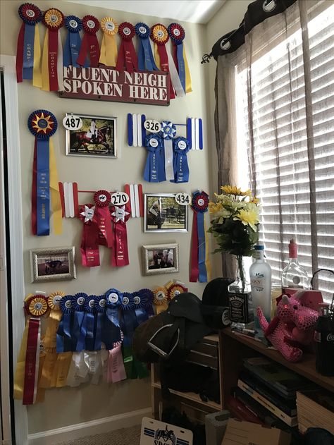 Cute sign and layout of ribbons and pictures Ribbon Trophy Display, Horseback Riding Ribbon Displays, Horseshow Ribbon Display Ideas, Displaying Horse Show Ribbons, Show Ribbons Ideas, Equestrian Ribbon Wall, Horse Ribbon Display Ideas Diy, Horse Riding Ribbons Display, Equestrian Ribbon Display