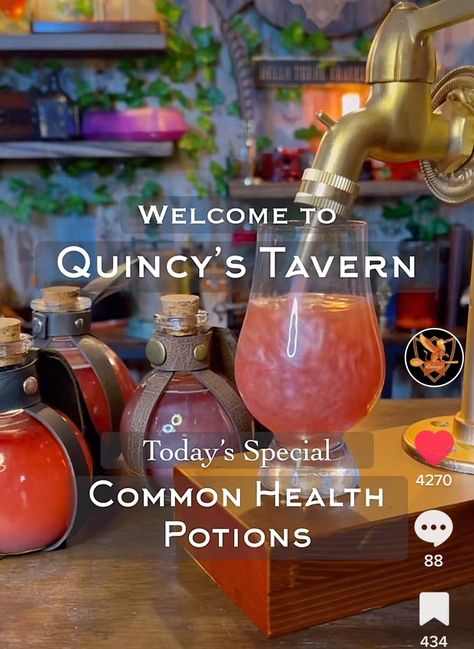 Pink drink pouring into small glass from faucet with glass travel flasks behind it D&d Cocktails, Dnd Themed Cocktails, Dungeons And Dragons Drinks, Dnd Themed Drinks, Dnd Mocktails, Dnd Drinks Non Alcoholic, Dnd Drinks Recipes, Dnd Themed Party, Dnd Drinks