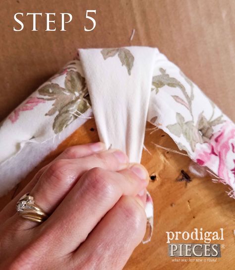 Step 5 of Upholstering Footstool - Stapling Corner | prodigalpieces.com Recover Footstool Diy, Footstools Ideas Diy Projects, Recovering Footstool Diy, Reupholster Footstool Diy, Foot Stools Diy, Footstools Ideas, Pergola With Lights, Footstool Ideas, Recover Chairs