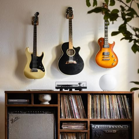 Living Room Guitar Display, Guitar Corner Ideas, Guitar Home Decor, Guitar Interior Design, Guitar And Amp Storage, Guitar Practice Space, Guitar Collection Aesthetic, Decorating With Guitars, Guitar Corner Living Rooms