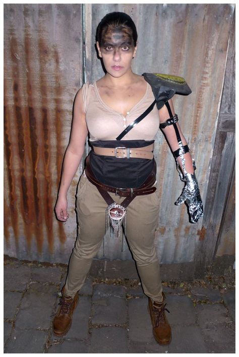 Furiosa, Mad Max: Fury Road costume.  Get more #costume and #Halloween inspiration on this blog! Over 400 homemade, DIY costume ideas! Madmax Costume, Mad Max Fury Road Costumes, Best Female Characters, Road Costume, Mad Max Costume, Dangly Necklace, Diy Costume Ideas, Brown Combat Boots, Masked Ball