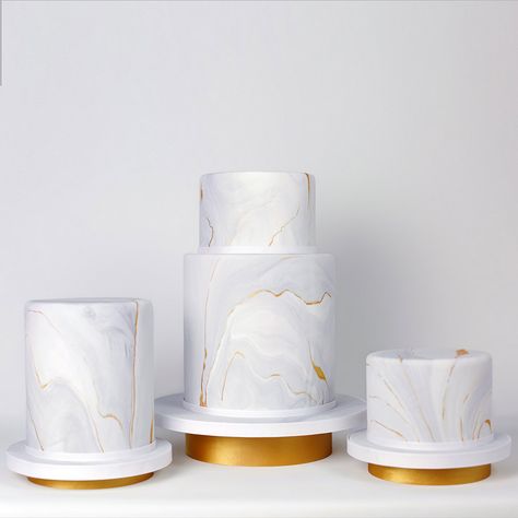 Take a look at this Marble Cake Set. Fondant covered cake with gray marble pattern and subtle gold details painted along the marbled lines. This makes for an elegant addition to any event. #wedding #weddinginspo #elopement #weddinginsperation #cake #cakeart #engagement #charmcitycakes #eventplanning #events #partyplanning 18th Party Ideas, Charm City Cakes, 18th Party, Wedding Planning Boards, 2 Layer Cakes, Bday Pics, 50th Anniversary Cakes, 21st Bday Ideas, Two Tier Cake