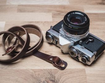 Leather Camera Strap with Camera Bumpers | Hand Made Leather Camera Strap | DSLR Camera Strap | Sterling Photographer Tshirt, Camera Neck Strap, Dslr Camera Straps, Horween Chromexcel, Tshirt Photography, Leather Camera Strap, Camera Dslr, Horween Leather, Photographer Gifts