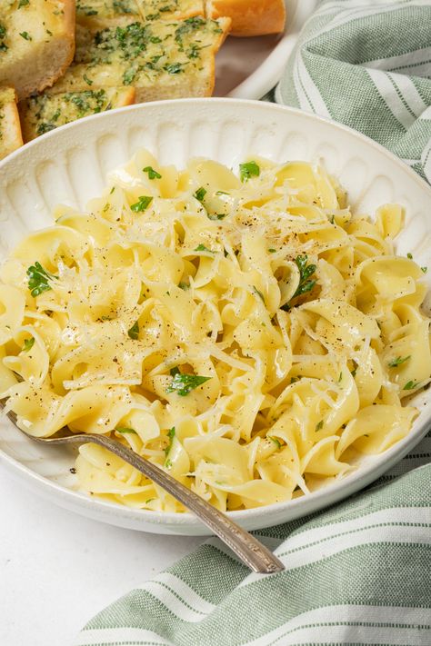 Vegan Buttered Noodles are as easy as they sound, but this recipe takes them up a notch with a few simple ingredients. Whether you add a few extras or just keep it simple, this delicious comfort food dish is perfect as an entree or side. Egg Noddle Recipes, Noddle Recipes, Buttery Noodles, Vegan Garlic Bread, Buttered Noodles Recipe, Vegan Cajun, Butter Noodles, Egg Noodle Recipes, Vegan Pasta Dish