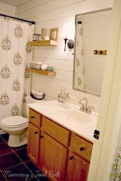 Small bathrooms don’t have to be short on style or space. Check out these nine inspiring decorating ideas that will turn your bathroom from bland to grand. Oak Shiplap, Bathroom On A Budget, Over The Toilet Cabinet, Shiplap Bathroom, Bathroom Counter Decor, Simple Bathroom Decor, Walk In Shower Designs, Ship Lap, Small Space Bathroom