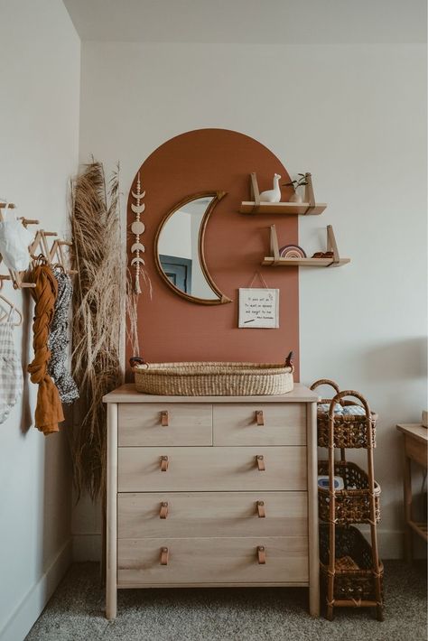 Clay Color Nursery, Neutral Rattan Nursery, Rattan Nursery Ideas, Boho Nursery Mural Wall, Boho Rattan Nursery, Floral Neutral Nursery, Black Mirror Nursery, Sun And Stars Nursery, Earth Tone Nursery Paint Colors