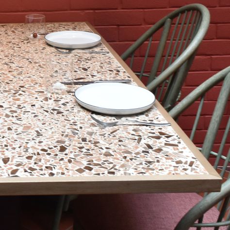 Outdoor Terrazzo Dining Table, Terrazzo Outdoor Table, Diy Marble Table Top, Restaurant Table Top Ideas, Terrazo Dining Tables, Terazzo Tables, Stone Table Outdoor, Tiled Dining Table, Tiled Table Top