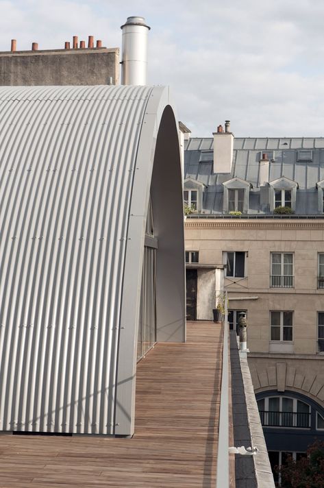 Post Office add prefab vaulted roof extension to Paris apartment Industrial Structure, Vaulted Roof, Affordable Prefab Homes, Quonset Homes, Quonset Hut Homes, Roof Cladding, Prefab Modular Homes, Curved Roof, Prefab Buildings