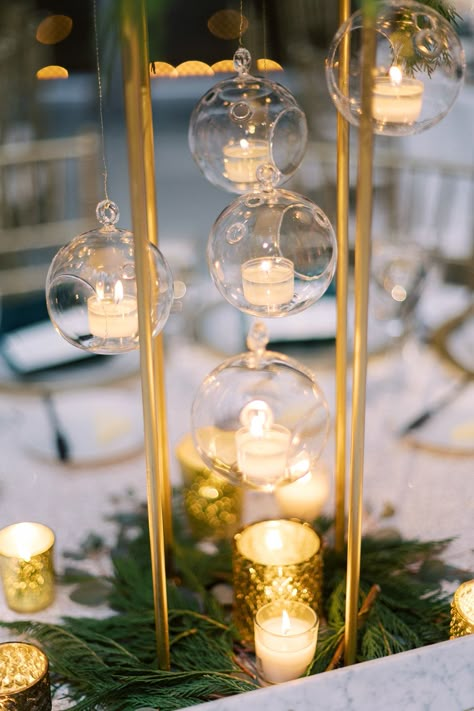 Hanging Candle Centerpieces Wedding, Green Gold Centerpiece, Centerpieces For Quince Green, Simple Gold Centerpieces, Wedding Gold Centerpieces, White And Gold Event Decor, Hunter Green Wedding Centerpieces, White Gold And Green Wedding Decor, Gold And Green Centerpieces