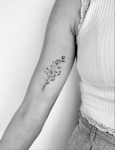 Birth Flower Tattoos Bicep, Wildflower Tattoo Inner Arm, Wildflower Tattoo Inner Bicep, Fine Line Tattoo Bicep, Fine Line Flower Tattoo Back Of Arm, Flower Tattoo On Inner Arm, Wildflower Bicep Tattoo, Wildflower Tattoo Bicep, Inner Beauty Tattoo