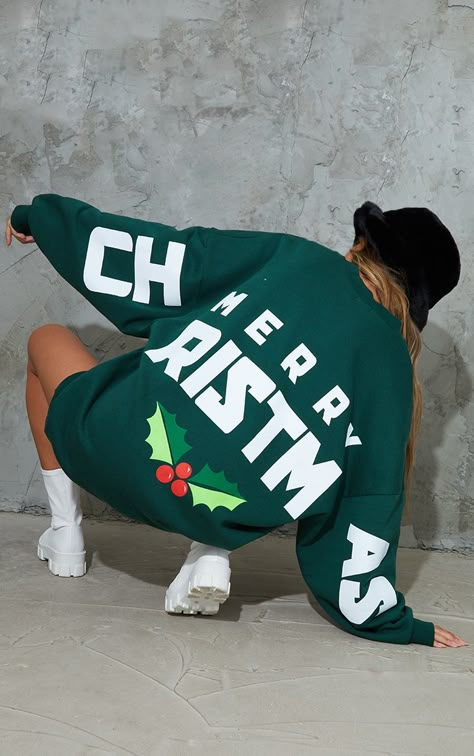 This green merry Christmas slogan oversized sweat jumper dress is everything we are loving this festive season. Brought to you in a green material with a 'Merry Christmas' print and an oversized fit, what more could you ask for This sweat jumper dress is a must-have for your festive wardrobe doll and you won't want to miss out. Team with your fave accessories and white boots for a look we are loving.   Length approx 88cm/34.5  (Based on a sample size UK 8)   Model wears size UK 8/ EU 36/ AUS 8/ US 4   Model Height - 5ft 9 Christmas Sweatshirt Ideas, Plus Size Corset Dress, Plus Size Corset Tops, Christmas Sweater Outfits, Christmas Slogans, Two Piece Dress Casual, Christmas Sweater Dress, Sweater Dress Oversized, Pull Oversize