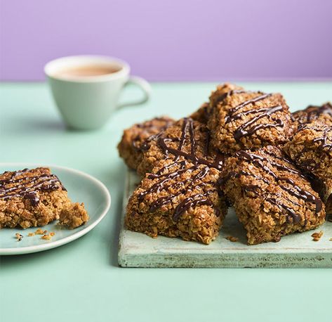 Flapjack with chocolate drizzle | Asda Good Living Melt Method, Flapjack Recipe, Soft Sugar, Porridge Oats, Chocolate Drizzle, Golden Syrup, Bittersweet Chocolate, Baking Tins, Baking Paper