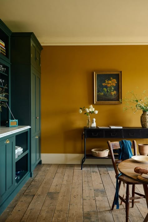 Mustard Yellow Paint Colors, Mustard Yellow Walls, Yellow Dining Room, Yellow Paint Colors, Mustard Walls, Devol Kitchens, Yellow Room, Yellow Living Room, Yellow Interior