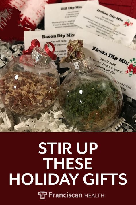 Stir up these holiday gifts. Check out these cute dip mix recipes for easy gift giving. Diy Soup Mix Ornaments, Dips In A Jar Gifts, Soup Mix In An Ornament, Ornament Dip Mix Gifts, Dip Mixes In Ornaments, Soup Mix Ornaments, Dip Mix Ornaments Recipes, Dry Dip Mixes For Gifts Recipes, Diy Dip Mixes For Gifts