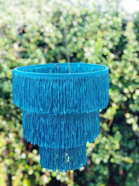 Trendy Fringe Chandelier DIY Tutorial - Creatively Beth Fringe Chandelier, Chandelier Diy, Trendy Fringe, Faux Cactus, Denim Pillow, Diy Chandelier, Beach Diy, Family Crafts, Fringe Trim