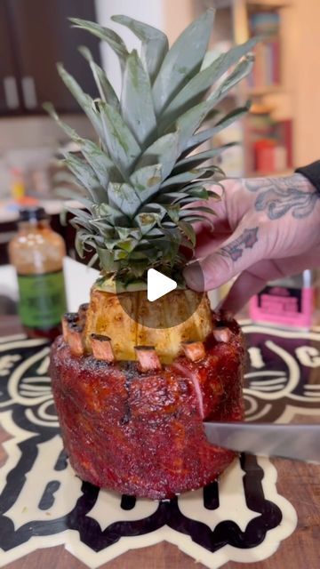 Benjamin Kendrick on Instagram: "Pineapple x Pork Ribs 🤤. This was a fun cook i did back on 12-18-23 and was inspired by my boy @svenddiesel This was one of the cooks i did that i couldn’t voiceover because i was sick.  Finally have the lungs to get some editing done.  Basically smoked this like the 3-2-1 rib recipe.  Before i wrapped the ribs around the pineapple, i rubbed the pineapple down with some @whistlepigwhiskey syrup.  First 3 hours was at 225°. Then just wrapped the whole thing in foil with apple juice to get the bone pull for almost 2 hours at 225°. Then removed from foil, sauced with Traeger Sweat and Heat BBQ Sauce and let that tack up for 45 minutes at 275°. These were delicious.  Pineapple was the best part 😋 
.
.
.
.
.
.
.
.
.
.
.
#traegergrills #kendrickbbq #porkribs #b Pineapple Ribs Recipe, Pineapple Ribs, Best Ribs Recipe, Bbq Pineapple, Pork Wraps, How To Cook Ribs, Pineapple Pork, Rib Recipe, Pork Rib Recipes