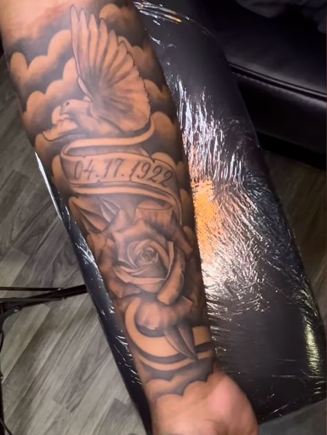 Outer Tattoo Forearm, Cloud Tattoo Sleeve For Men Forearm, Across The Stomach Tattoos, Rip Arm Tattoo Men, Black White Sleeve Tattoo, Roman Numeral Tattoo Men Arm Half Sleeves, Tattoo Sleeve Designs For Men Black, Humble Beast Tattoo Men Forearm, Tattoo Ideas Black Male