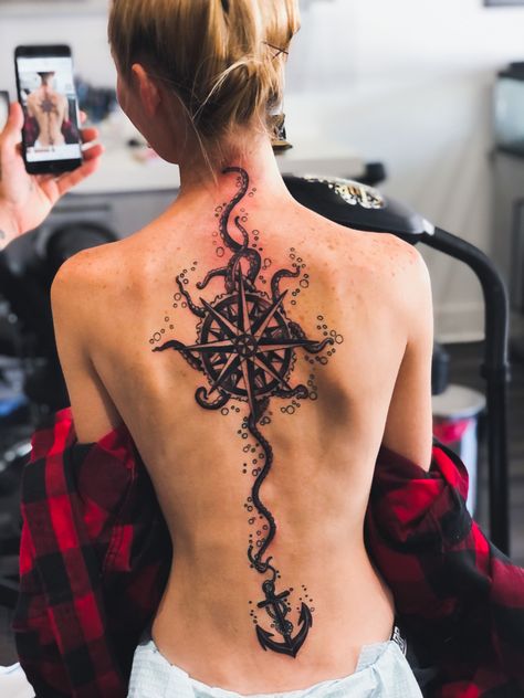 spine tattoo; women spine tattoo; back tattoo; ocean themed tattoo; octopus tattoo; compass tattoo; anchor tattoo; back tattoo for women Spine Tattoos For Women Sp, Womens Spinal Tattoos, Whole Spine Tattoos For Women, Mens Spine Tattoo Ideas, Large Spine Tattoos For Women, Spinal Tattoo Ideas, Big Spine Tattoos For Women, Male Spine Tattoos, Spine Tattoos Men