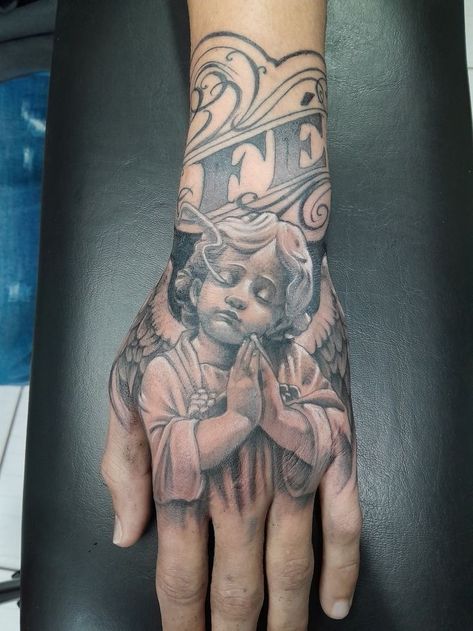 Letter Tattoos On Hand, Boys Hand Tattoo, Angel Hand Tattoo, Jesus Hand Tattoo, Tattoo Wings, Memorial Tattoo Ideas, Arm Tattoos For Guys Forearm, Half Sleeve Tattoo Stencils, Hand And Finger Tattoos