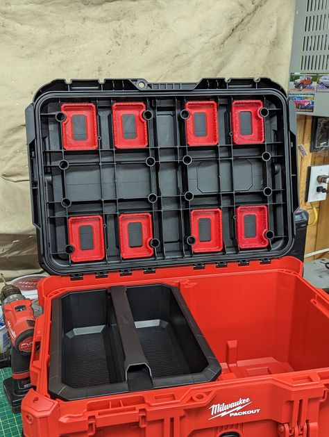 "Here are some Lid Storage options for all your impact and spare or random driver bits! These holders will fit your Milwaukee bit rails from your bit cases, but included in the order will be x1 3D printed bit rail for each bit holder. These bit holders fit into the lid of the: Milwuakee Packout 22\" Toolbox (48-22-8424) Milwaukee Packout 22\" Large Toolbox (48-22-8425) Packouts are made with PP5 plastic, we would suggest using an approved plastic glue to adhere bit holders for best results. Double sided tape can also sometimes work. Make sure to clean bit holder mounting surface beforehand.  Per one order comes with x8 bit holders. Does NOT come with a Packout, with any bits, or with Milwaukee bit rails. If you'd like a custom colour for your bit rails, please type that in. If you have any Milwaukee Tool Box Ideas, Milwaukee Packout Ideas, Milwaukee Packout Mods, Packout Mods, Milwaukee Tool Box, Van Organization, Bit Storage, Rolling Tool Box, New Milwaukee Tools