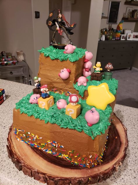 Smash Bros Cake Birthdays, Super Smash Birthday Party, Kirby Cake Ideas, Mario Birthday Food, Super Smash Bros Cake, Smash Bros Cake, Mario Bros Birthday Cake, Kirby Cake, Super Smash Bros Party