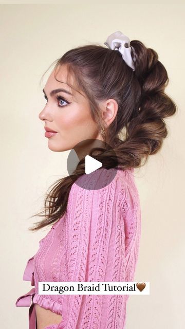 Jackie Wyers on Instagram: "🎀 The Dragon Braid: A Hair Tutorial🎀   What I’ve been calling a faux braid, or pull-through braid, has been renamed the dragon braid!🐉   I love the braid up high because it looks so fluffy and holds the volume so you can see it from straight on. Add with a big satin scrunchie or bow for a super cute look 🎀   I like my hairstyles a little messy and worn-in but it looks so nice polished too. & that’s how to do a dragon braid!   Wearing a thrifted bow sweater from @forloveandlemons   #dragonbraid #hair #hairtutorial #pullthroughbraid #hairstyles #tutorial #howto #dragonbraidtutorial #easyhairstyles #ponytail #ponytailbraids #ponytailtutorial #brunette" Dragon Braid Tutorials, Easy Pull Through Braid, Dragon Braid Hairstyles, Hair Braids Tutorials, Faux Braid, Jackie Wyers, Dragon Braid, Faux Braids, Very Easy Hairstyles