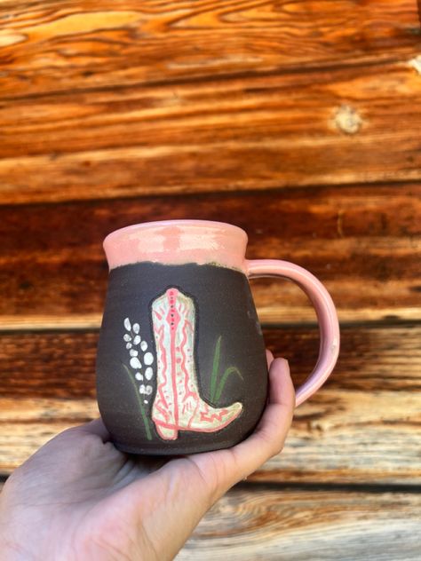 Pink cowgirl boot mug black clay hand painted with underglaze Western Pottery Painting Ideas, Cowgirl Mug, Pink Cowgirl Boot, Boot Mug, Western Pottery, Pottery Painting Ideas, Painting Pottery, Pink Cowgirl Boots, Diy Pottery Painting