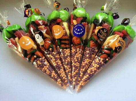 Halloween Sweet Cones Ideas, Halloween Sweet Cones, Candy Corn Party Favors, Candy Corn Yarn Cone, Candy Bar Covers Halloween, Sweetie Cones, Treat Cones, Candy Kabobs, Halloween Gift Baskets