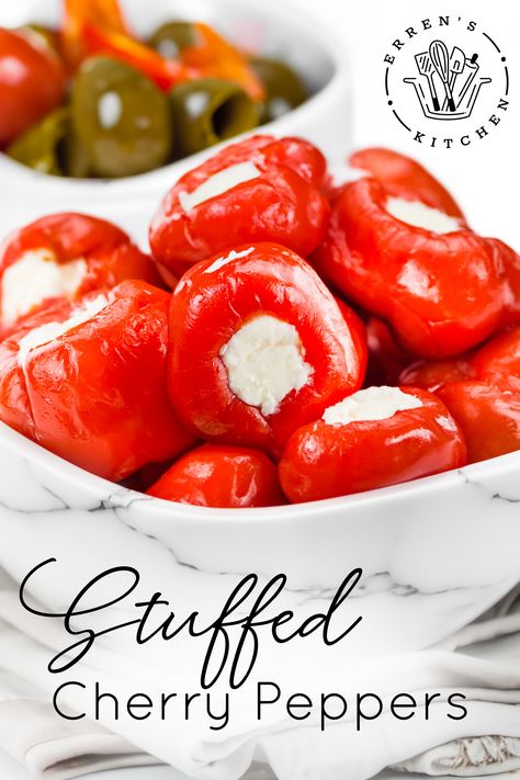 This easy, finger food recipe for Stuffed Cherry Peppers delivers a burst of creamy, tangy, and slightly spicy flavors. With rich cheeses, zesty garlic, and flavorful cherry peppers, it's an appetizer that's sure to impress!
Savor these Stuffed Cherry Peppers, packed with creamy cheeses for a flavorful, easy, and impressive appetizer suitable for any occasion or party such as Thanksgiving, Super Bowl, movie night snack, and more!

Stop at errenskitchen.com for easy, delicious recipes! Pepper Shooters Stuffed, Cream Cheese Stuffed Sweet Peppers, Stuffed Cherry Peppers, Cherry Pepper Recipes, Cherry Bomb Pepper, Easy Finger Food, Cherry Peppers, Impressive Appetizers, Pepper Recipes