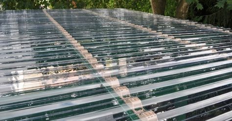 You can have a roof made of glass, metal, slate, tiles, and shingles for your property. But, polycarbonate is what you must use when you a... Greenhouse Lights, Corrugated Plastic Roofing, Beautiful Greenhouse, Plastic Roofing, Polycarbonate Roof Panels, Greenhouse Supplies, Greenhouse Ideas, Backyard Gazebo, Wooden Greenhouses