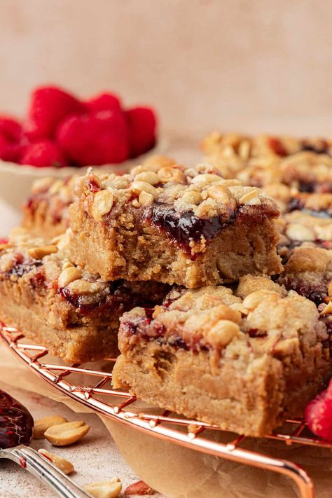 Peanut Butter Jelly Bars Peanut Brittle Bars, Peanut Butter Cookie Bars Recipes, Peanut Butter Jelly Bars, Cookie Dough Peanut Butter, Peanut Butter And Jelly Bars, Peanut Butter Jelly Recipes, Peanut Butter And Jelly Cookies, Reese's Peanut Butter Bars, Peanut Butter Jelly Cookies