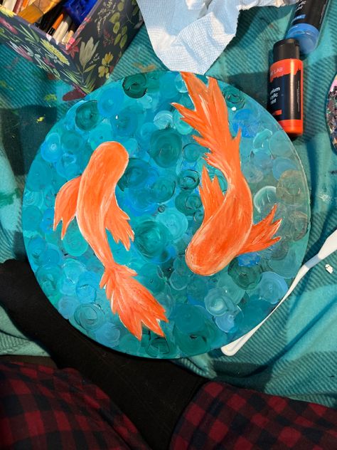 Ceramic Coy Fish, Under The Sea Pottery Painting, Koi Fish Pottery Painting, Crockadoodle Ideas, Round Canvas Ideas, Coy Fish Art, Fish Pottery Painting, Round Paintings Canvases, Fish Bowl Painting