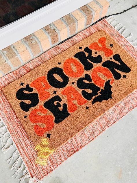 WANT THE CHEETAH UNDERLAY MAT If you desire The Cheetah rug its an 24x36 underlaying rug that can be found at hobby lobby. About your doormat. 18x30 Spooky Season Doormat My doormats come with a slip resident backing, with a natural brown coir front. This coir fronting is great for collecting dirt and grim but in a stylish way. To ensure long lasting results i do recommend that you keep your doormat in a dry, covered area is ideal. To clean, simply shake or vacuum away any debris. What is the it Spooky Rugs Diy, Halloween Door Mat Painting, Fall Doormat Painting, Halloween Door Mats Diy, Diy Halloween Welcome Mat, Fall Diy Doormat, Halloween Door Mat Diy, Fall Door Mats Diy, Fall Doormat Ideas