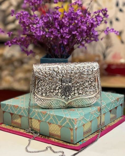 Hello everyone 💯*#New designs* *Exclusive Hand Carved High quality silver clutch!!!👝👛💟* Size-8x6 ₹ 1200 shipping free Guaranteed never gets black. Look amazing on heavy dresses and best quality Book your orders We Traditional Silver Clutch As Gift, Traditional Silver Party Clutch, Traditional Silver Clutch Bag, Silver Clutch With Handwork, Luxury Silver Embroidered Clutch, Heavy Dresses, Silver Clutch, Potli Bags, Diwali