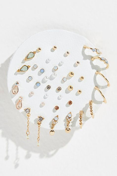 Set of 40 small delicate studs including 13 sets with shimmering stones and 7 sets with fun metal shapes. Easily mix and match to create your unique look. | Teeny Tiny Mega Stud Earring Set by Free People in Gold Micro Earrings, Cute Earring Sets, Cute Earring Studs, Earring Pack, Stacked Gold Earrings, Elegant Earring Stack, Cute Earring Stacks, Earrings Set, Rose Gold Earring Stack