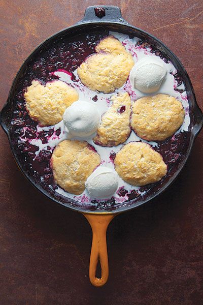 "Blueberry Slump  A sticky biscuit dough is dropped onto blueberries in this classic New England dessert, which is called a "slump," "grunt," or "cobbler," depending on who you're asking." Cobbler:)) Easy Blueberry Desserts, Slow Cooker Desserts, Blueberry Desserts, Brownie Desserts, Dessert Aux Fruits, Easy Blueberry, Blueberry Recipes, Think Food, Cast Iron Cooking